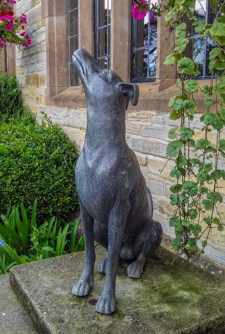 dog statue at hotel entrance