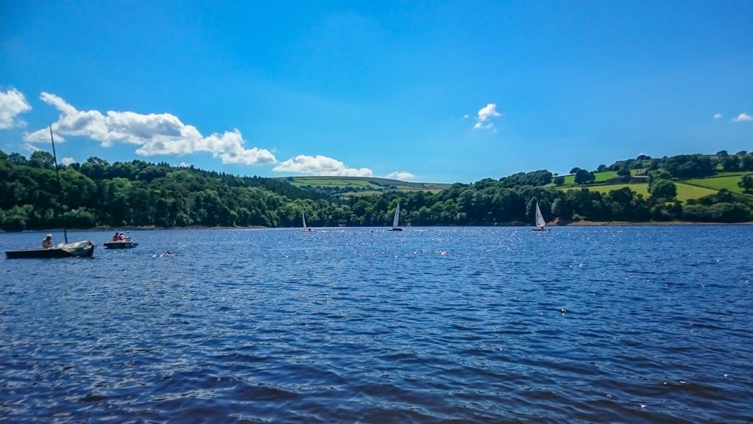 sailing boats from the sailing club on damflask reservoir