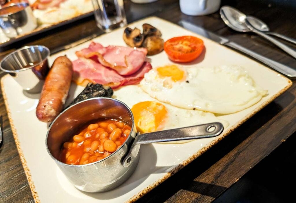 full english with sausage at fence gate