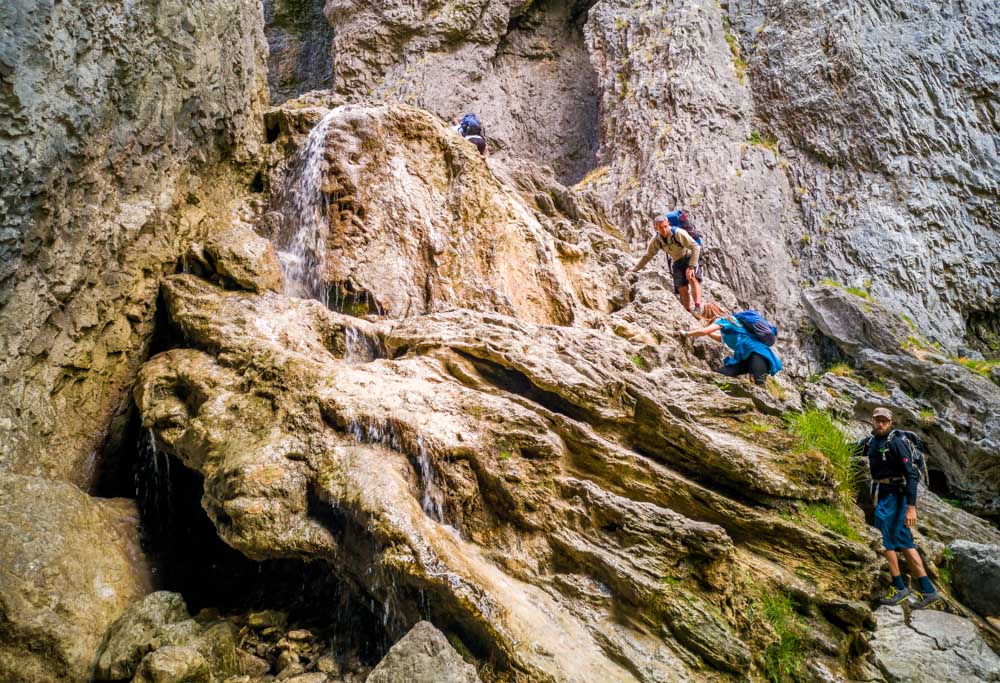 climbers on the waterfall