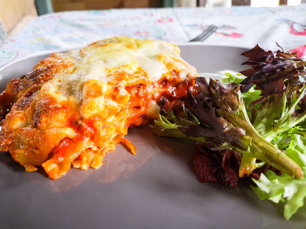 Lasagna Al Forno with salad garnish