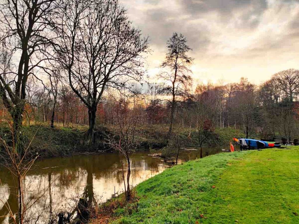 river by the cabins