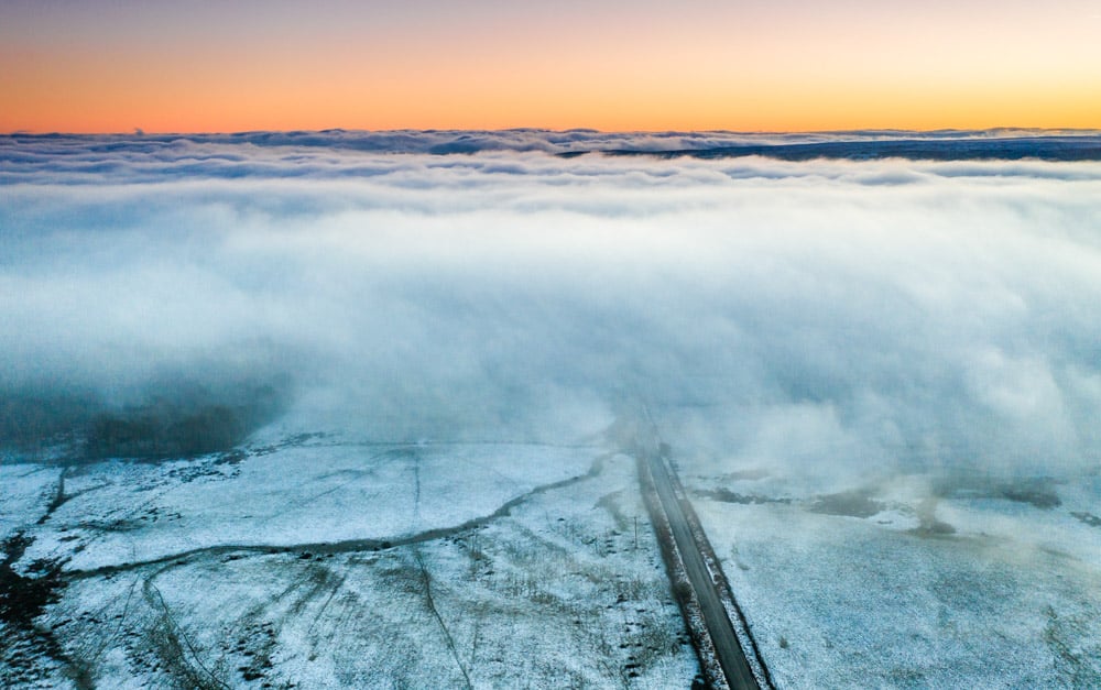 sunset cloud inversion and snow